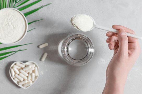 • Collagen supplements on a table with a glass of water.• A person drinking a collagen smoothie post-workout.